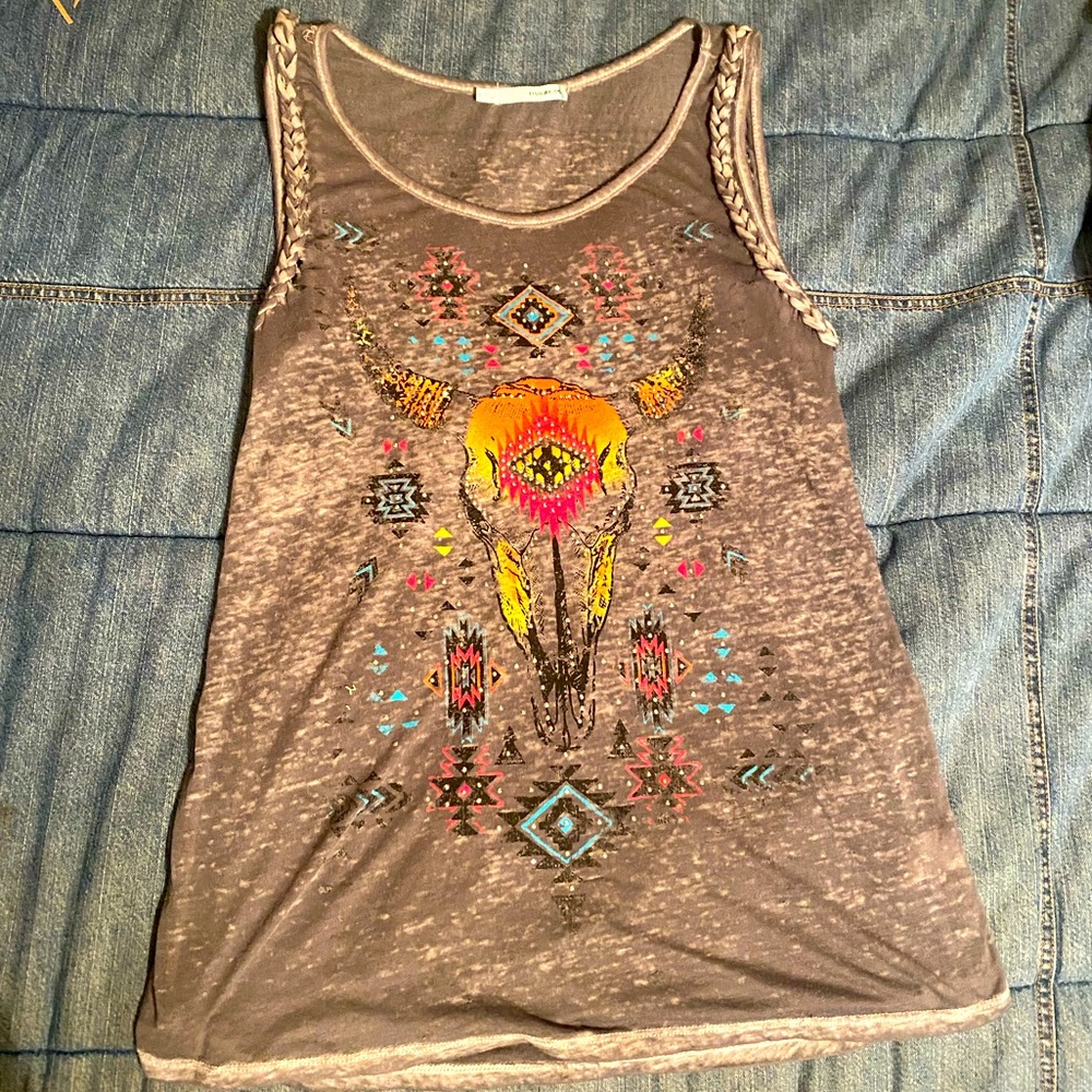 Maurice’s skull tank top